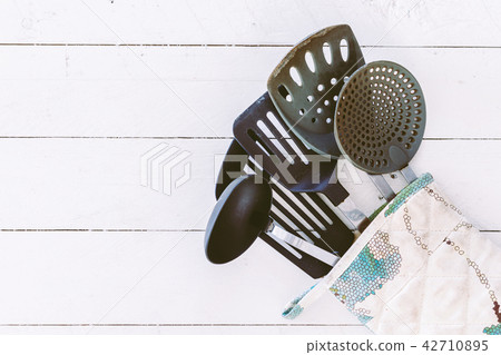 Kitchen utensil on wooden table Kitchen utensil on wooden table 42710895