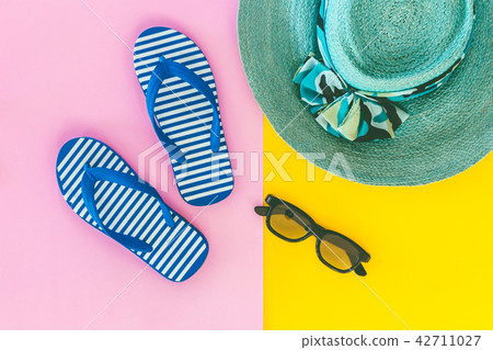 Beach accessories on table 42711027