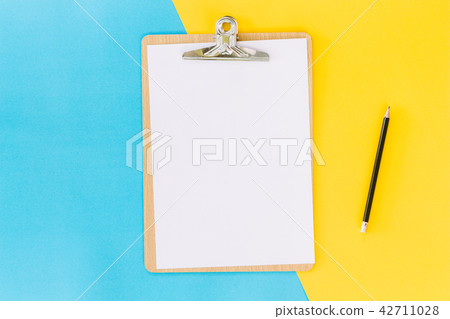 Wooden clipboard on table 42711028
