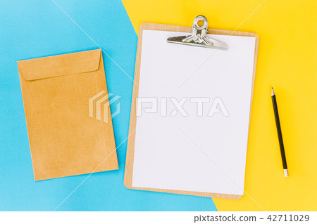 Wooden clipboard on table 42711029