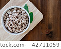 Minced meat on wooden table 42711059