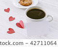 Heart and coffee on a wooden background 42711064