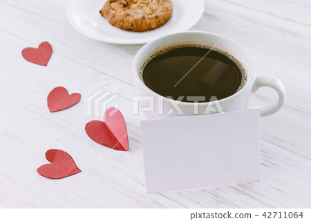 Heart and coffee on a wooden background Heart and coffee on a wooden background 42711064