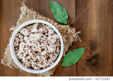 Minced meat on wooden table Minced meat on wooden table 42711087