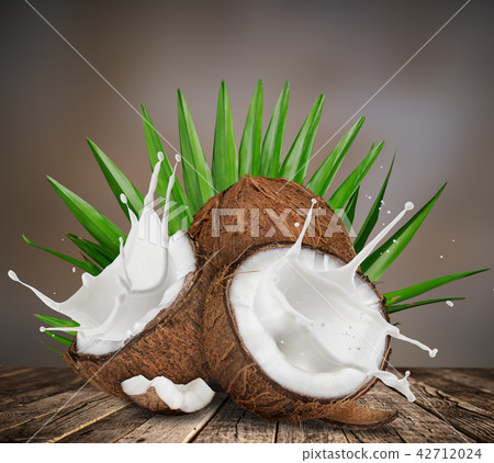 close-up of a coconuts with milk splash. 42712024