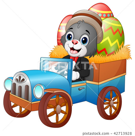 Easter Bunny driving a car carrying easter eggs Easter Bunny driving a car carrying easter eggs 42713928