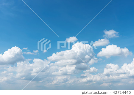Blue sky and white clouds with space for text. 42714440
