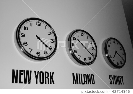 Clock on the wall showing time in the world 42714546