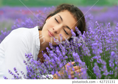 beautiful young woman is in the lavender field beautiful young woman is in the lavender field 42715131