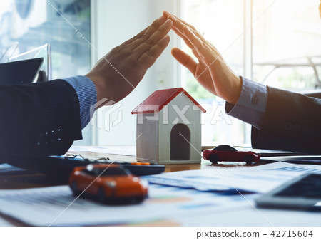 Business man team agree to buy a new estate Business man team agree to buy a new estate 42715604