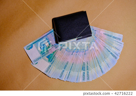 wallet on brown craft paper background 42716222