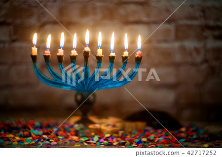 Brightly Glowing Hanukkah Menorah soft focus Brightly Glowing Hanukkah Menorah soft focus 42717252
