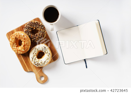 doughnuts with cup of coffee doughnuts with cup of coffee 42723645
