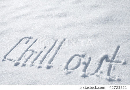 Chill out. Hand drawn text on snow Chill out. Hand drawn text on snow 42723821