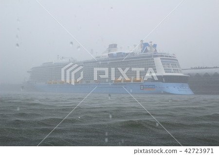 storm on the sea with rain downpour 42723971