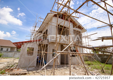 Construction residential new house in progress Construction residential new house in progress 42725957