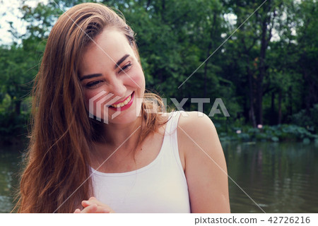 Beautiful girl happy and smile portrait close up. Beautiful girl happy and smile portrait close up. 42726216