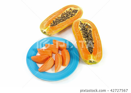 papaya fruit in blue disc with white background papaya fruit in blue disc with white background 42727567