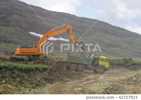 heavy machinery on the construction of roads heavy machinery on the construction of roads 42727923