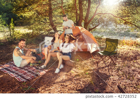 Party, camping of men and women group at forest. They relaxing 42728352