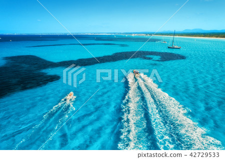 Speed motorboats on the seashore in Spain 42729533