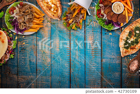 Top down view on traditional turkish meals on vintage wooden table. 42730109
