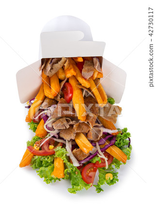 Turkish Kebab box with french fries on white background. Turkish Kebab box with french fries on white background. 42730117