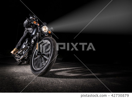 High power motorcycle chopper at night. 42730879