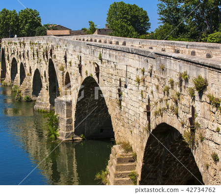 Old bridge above river in Beziers Old bridge above river in Beziers 42734762