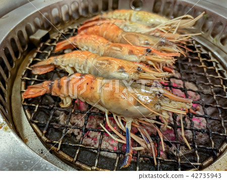 Grilling prawn on charcoal stove Grilling prawn on charcoal stove 42735943