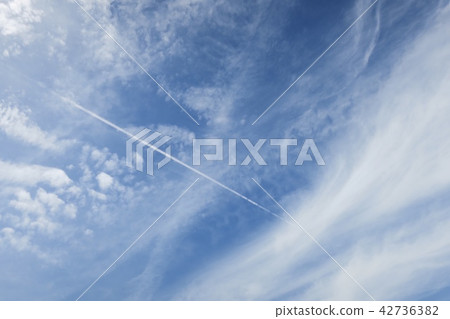 Blue sky and airplane cloud 42736382