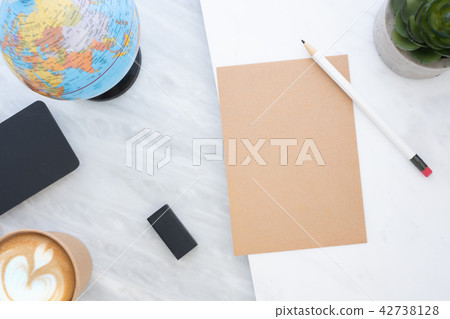 Top view of white pencil on brown paper 42738128