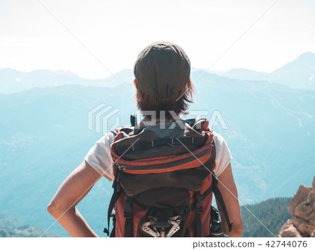 One person backpacker looking at view One person backpacker looking at view 42744076