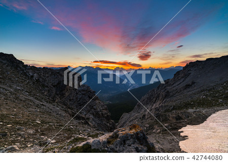 The Alps at sunrise. Colorful sky majestic peaks The Alps at sunrise. Colorful sky majestic peaks 42744080