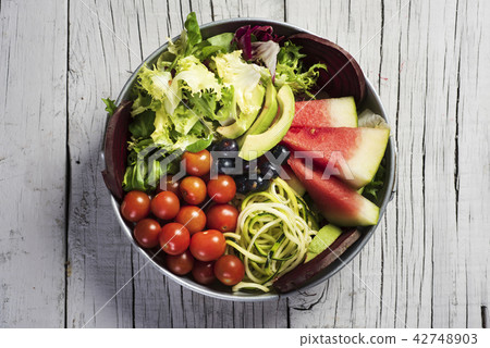 buddha bowl on a white wooden table buddha bowl on a white wooden table 42748903