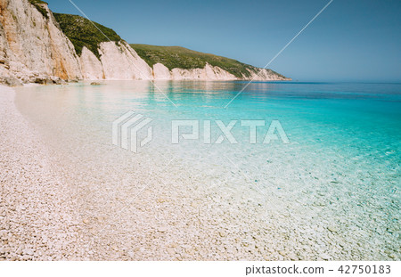 Fteri beach in Kefalonia Island, Greece. Most beautiful beach with pure azure emerald sea water 42750183