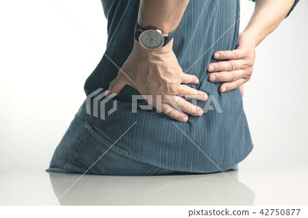 A man suffering from backache, spinal injury A man suffering from backache, spinal injury 42750877