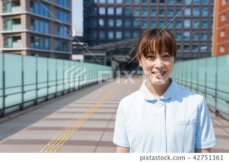 Nurse walking outside 42751361