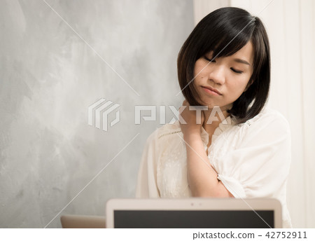 unhealthy female in white top with pain in neck unhealthy female in white top with pain in neck 42752911