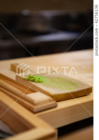 Partly grated fresh root of Wasabi by Oroshigane 42756136