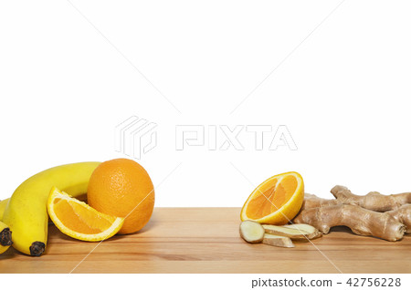 Fruits for tonifiyng smoothies on cutting board. 42756228