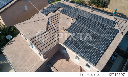 Solar Panels Installed on Roof of Large House Solar Panels Installed on Roof of Large House 42756397