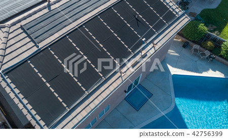 Thermal Solar Panels Installed on the House Roof Thermal Solar Panels Installed on the House Roof 42756399