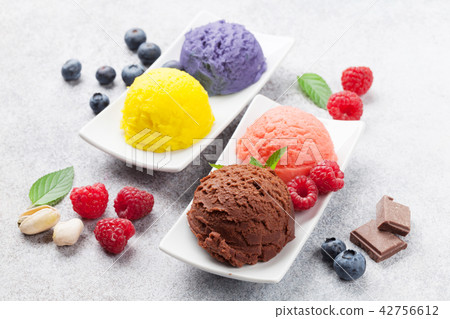 Ice cream with nuts and berries 42756612
