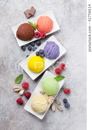 Ice cream with nuts and berries 42756614