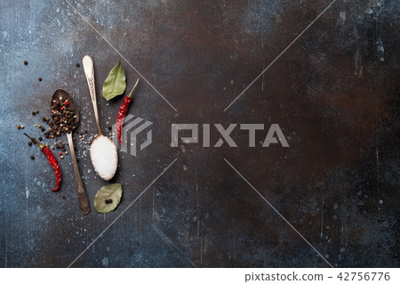 Spices in spoons Spices in spoons 42756776