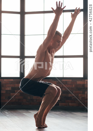 yoga instructor chair pose strong sporty trainer yoga instructor chair pose strong sporty trainer 42756828