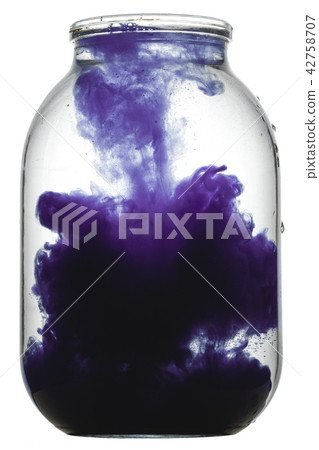 Paint swirling in water. 42758707