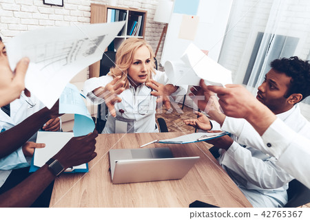 Doctor's Showing Medical Documents To The Chief. 42765367