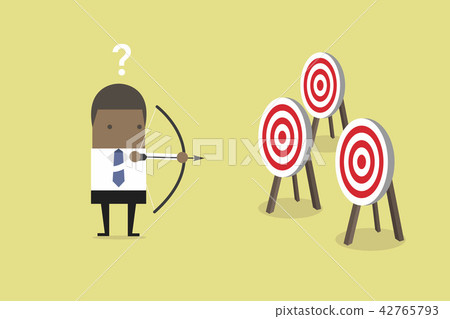 Businessman confused by multiple bulls eye target. Businessman confused by multiple bulls eye target. 42765793